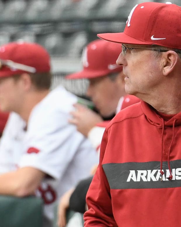 Arkansas Razorbacks coach Dave Van Horn getting a message to the fielders during a game with Illinois State on Wednesday afternoon.